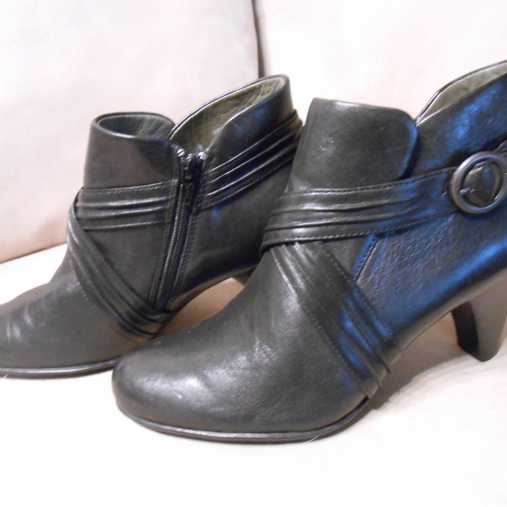 Women’s “Born Crown” black leather, high heeled boots, size 10 .